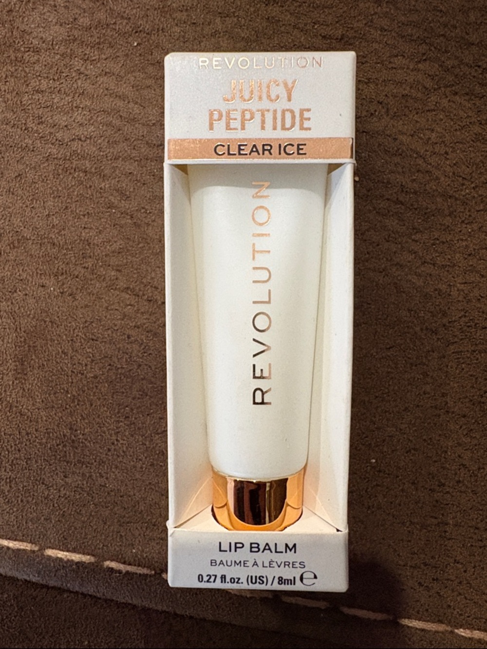 Revolution Juicy Peptide Clear Ice Lip Balm - White with Gold Cap